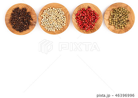 Mixed of peppers hot, red, black, white and green pepper in wooden bowl isolated on white background 46396996