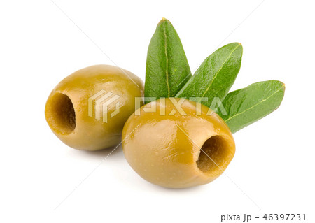 Green olives with leaves isolated on a white background Green olives with leaves isolated on a white background 46397231