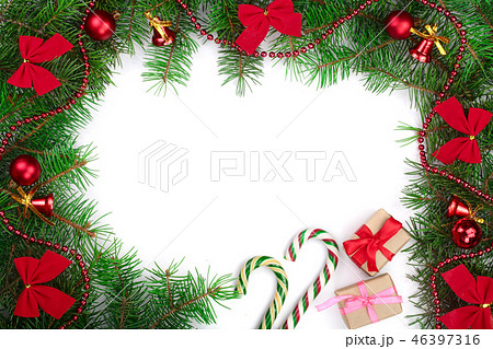 Christmas frame decorated with red bows and balls isolated on white background with copy space for 46397316