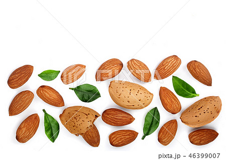 almonds with leaves isolated on white background with copy space for your text. Top view. Flat lay almonds with leaves isolated on white background with copy space for your text. Top view. Flat lay 46399007