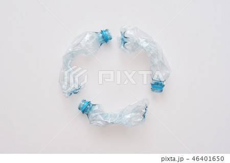 Step to green life. Circle of crumple plastic bottles 46401650