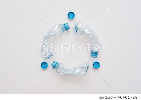 Step to green life. Circle of crumple plastic bottles 46401738