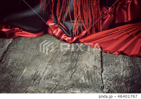 Clothing for Flamenco dance and fan on thedesk. Clothing for Flamenco dance and fan on thedesk. 46401767