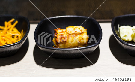 kimchi appetizer and other banchan side dishes 46402192