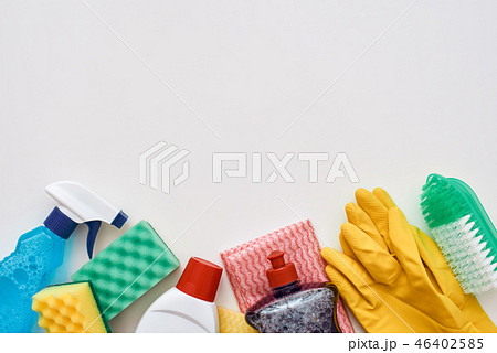 Cleaning tools. Spray bottle and other items isolated, cropped photo Cleaning tools. Spray bottle and other items isolated, cropped photo 46402585