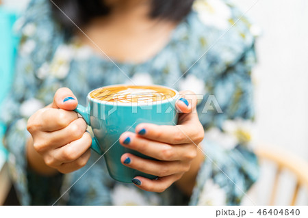Latte art coffee cup in green glass 46404840