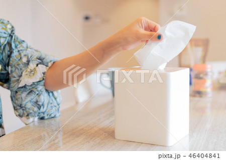 woman hand picking napkin,tissue paper 46404841