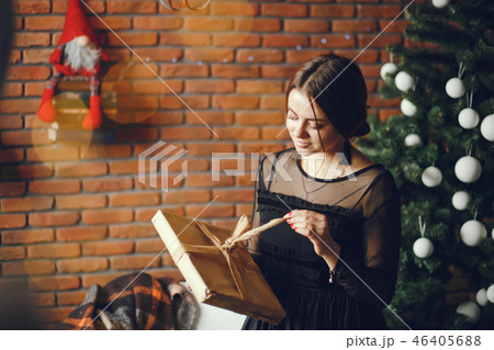 Lady with a present. 46405688