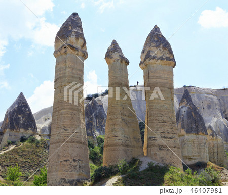 Large phallic mountain rock towers in the valley  46407981
