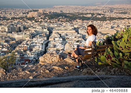 woman sitting on Lycabettus Hill 46409888