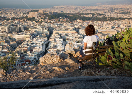 woman sitting on Lycabettus Hill 46409889