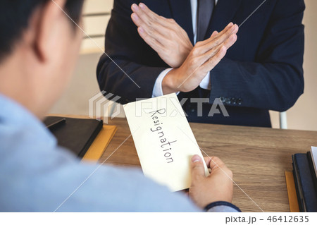 Businessman sending a resignation letter to employer boss in ord 46412635