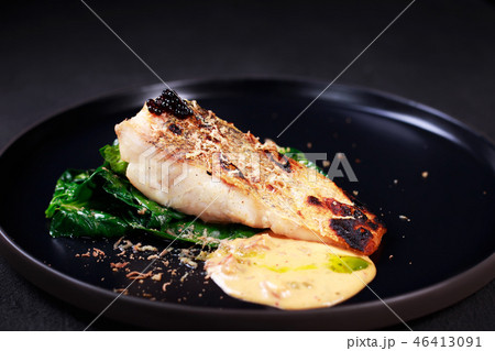 pikeperch with spinach garnishing and sauce pikeperch with spinach garnishing and sauce 46413091