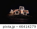 Blurred wheel loader decorated with lights 46414279