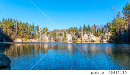 Natural lake in Adrspach rocks on sunny autumn day. Adrspach-Teplice sandstone rock town, Czech 46415150