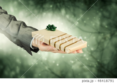 Man presenting his gift 46418791