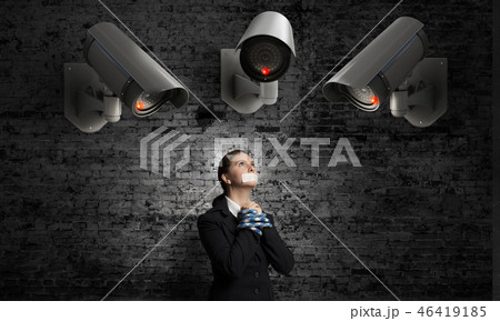 Camera keep an eye on woman Camera keep an eye on woman 46419185