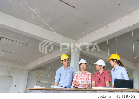 Group of engineers meeting in construction site. Group of engineers meeting in construction site. 46419758