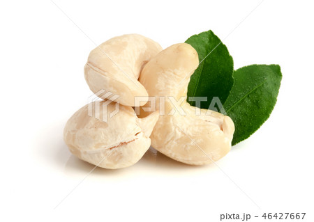cashew nuts with leaf isolated on white background. macro cashew nuts with leaf isolated on white background. macro 46427667