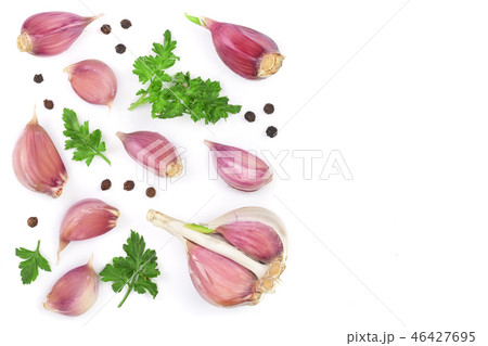 garlic with peppercorns and parsley isolated on white background with copy space for your text. Top 46427695