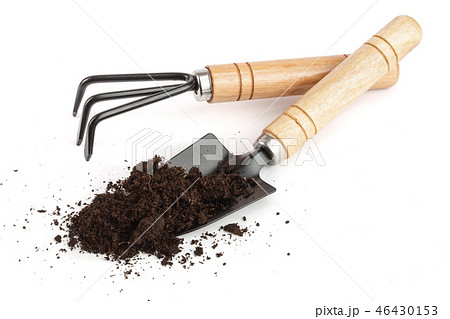 garden tools in soil isolated on white background garden tools in soil isolated on white background 46430153