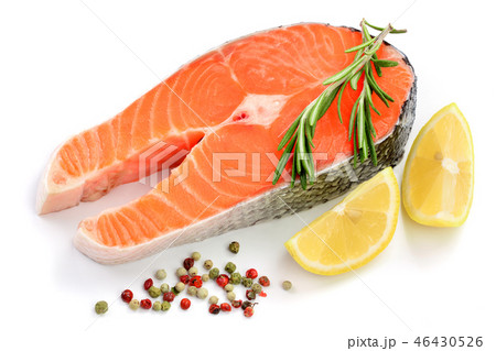 Slice of red fish salmon with lemon, rosemary and peppercorns isolated on white background 46430526