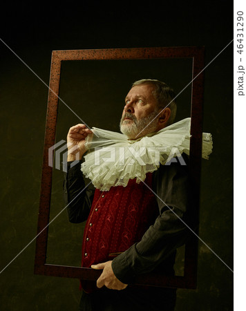 Official portrait of historical governor from the golden age. Studio shot against dark wall. Official portrait of historical governor from the golden age. Studio shot against dark wall. 46431290