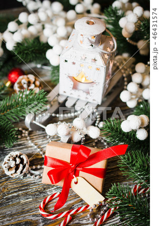 Christmas still life with lantern and decorations Christmas still life with lantern and decorations 46431574