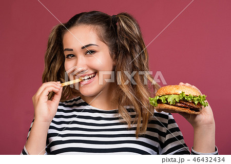 Close up face portrait girl with fast food. Close up face portrait girl with fast food. 46432434