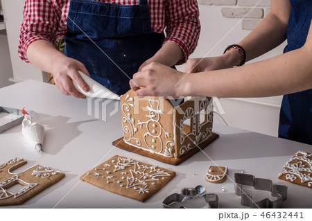 Making of christmas gingerbread house.  46432441