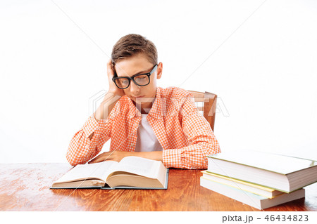 teen guy fell asleep sitting with books, student teen guy fell asleep sitting with books, student 46434823