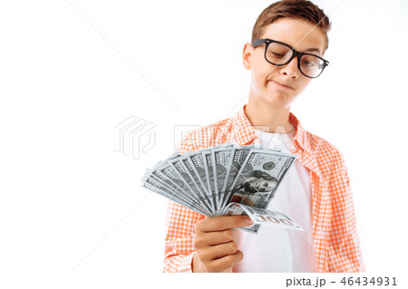 A young man with glasses thought about what A young man with glasses thought about what 46434931