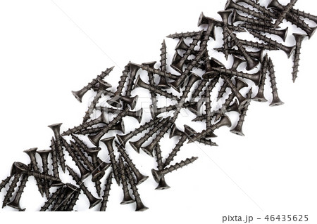 black screws isolated on white background with copy space for your text. Top view. black screws isolated on white background with copy space for your text. Top view. 46435625