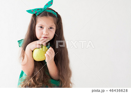 beautiful girl holding a Green Apple fruit 46436628