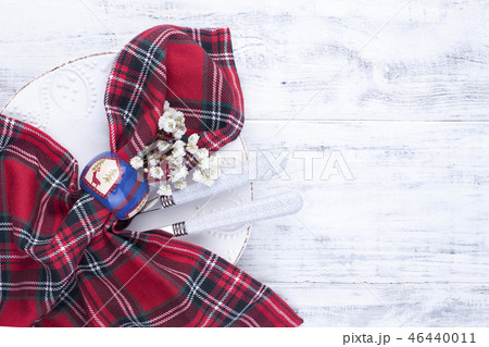 Cutlery, tablecloths and napkins for celebrating Christmas. Free space for text. 46440011