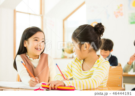 Two Young Female Students In Class 46444191