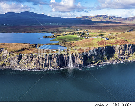 Aerial view of the dramatic coastline at the cliffs by Staffin with the famous Kilt Rock waterfall - 46448837