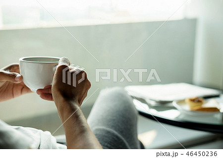 Morning with a book and cup of coffee. 46450236