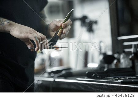Tools for cutting beard barbershop top view. Vintage tools of barber shop on wooden background 46456128
