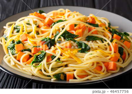 autumn meal of spaghetti with pumpkin, spinach autumn meal of spaghetti with pumpkin, spinach 46457756