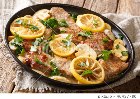 Italian recipe of delicious veal scaloppini 46457780