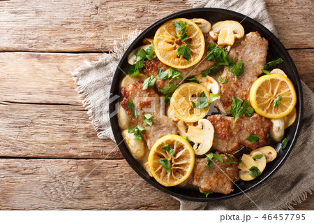 Tasty Italian fillet of veal scaloppini 46457795