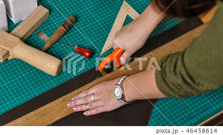 Tanner cuts off leather blank Tanner cuts off leather blank 46458614