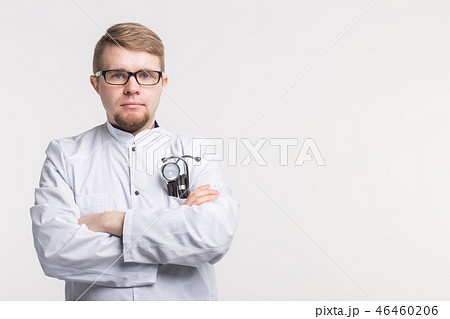 Medical doctor man with stethoscope over white background with copy space 46460206