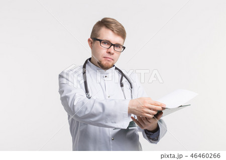 Doctor with stethoscope, holding the document folder on white background Doctor with stethoscope, holding the document folder on white background 46460266
