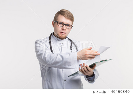Medicine and health concept - doctor with stethoscope holding document folder on white background 46460340