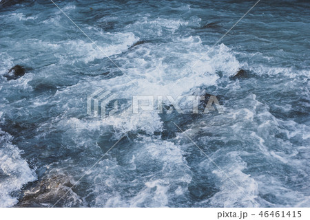 Blue flowing water of mountain river 46461415