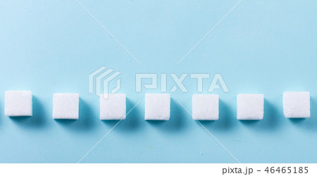 Sugar on blue background Sugar on blue background 46465185