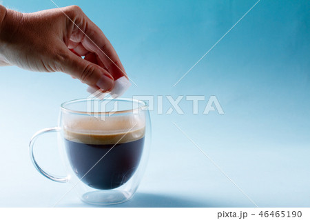 To cubes of sugar in spoon 46465190