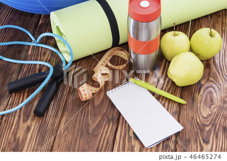 yoga Mat and water bottle close-up. yoga Mat and water bottle close-up. 46465274